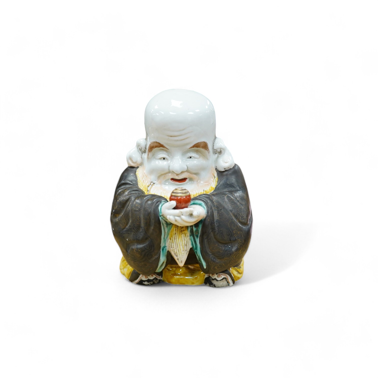 A Japanese green Kutani porcelain figure of Fukurokuju, 19cm. Condition - poor, large hairline crack across back shoulders and to base